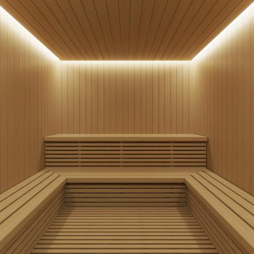 an empty sauna with a bench and lights at SH Jávea in Jávea