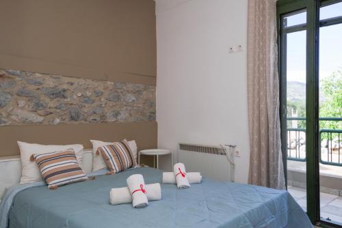 Ένα ή περισσότερα κρεβάτια σε δωμάτιο στο Vasilikata