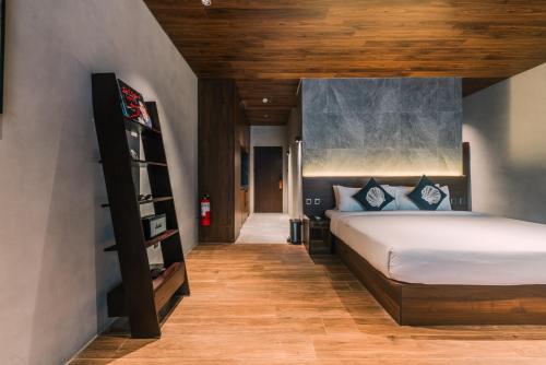 Letto o letti in una camera di Piece Lio from Japan Managed by H Hospitality Group