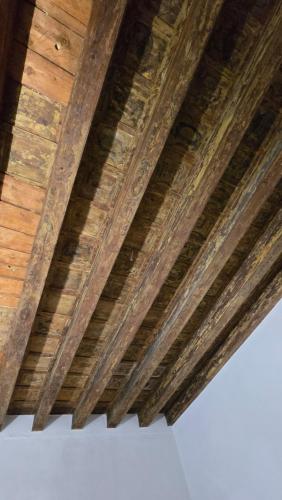 a close up of a wooden ceiling at Ca' Amore Venezia in Venice