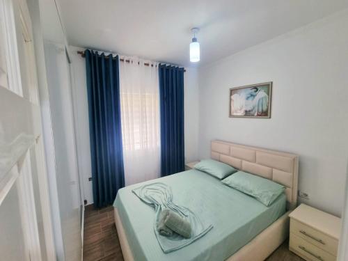 Ένα ή περισσότερα κρεβάτια σε δωμάτιο στο Teli's Apartments