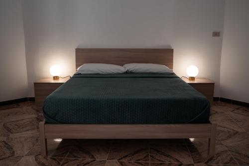 Кровать или кровати в номере Vittorio Emanuele - Location6