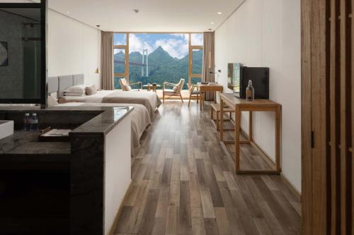 Televisyen dan/atau pusat hiburan di Mountain View Boutique Hotel