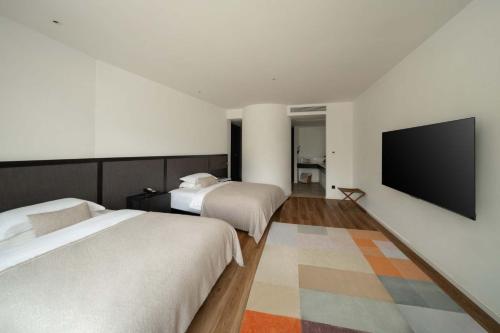 Katil atau katil-katil dalam bilik di Mountain View Boutique Hotel