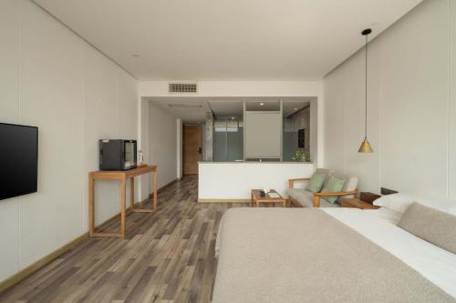 Televisyen dan/atau pusat hiburan di Mountain View Boutique Hotel
