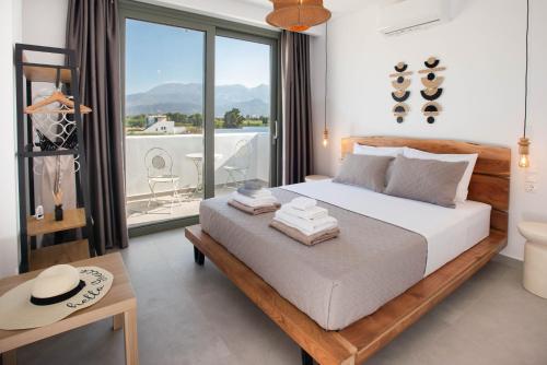 Postel nebo postele na pokoji v ubytování Mediterranean Blue Suites & Villa - Blue Villa