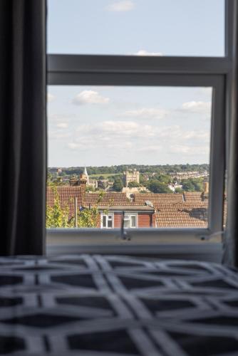 a window with a view of a city at CastleView Haven - Contractors welcome -Strood Rochester sleeps 12 in Strood