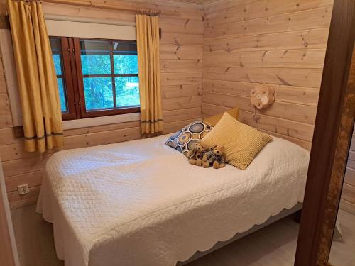 En eller flere senge i et værelse på Vanamo