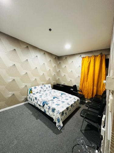 Katil atau katil-katil dalam bilik di Elite Shine Holiday Home