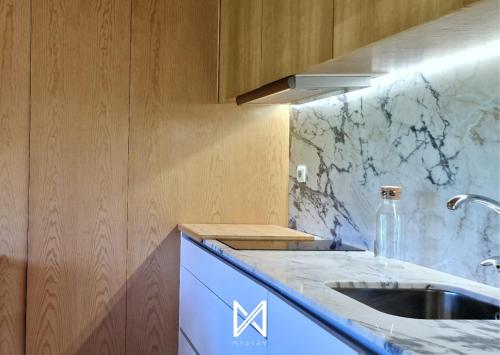 Køkken eller tekøkken på MyStay - Quinta do Louro