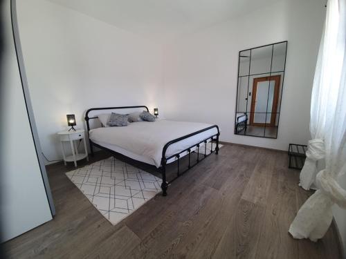 Ένα ή περισσότερα κρεβάτια σε δωμάτιο στο Villa Lidia