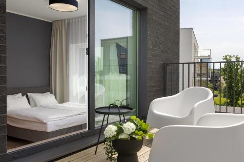 Voodi või voodid majutusasutuse Rare Apartments - Self Check-In Miniapartments toas