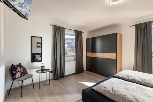 Una cama o camas en una habitación de Apart Bergverliebt