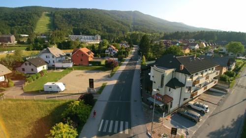 an aerial view of a small town with a street at Garni Hotel Terano in Maribor in Maribor