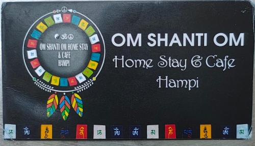 a sign for a hong shanghai home stay and cafe at Om Shanti Om Home Stay & Cafe Hampi in Hampi