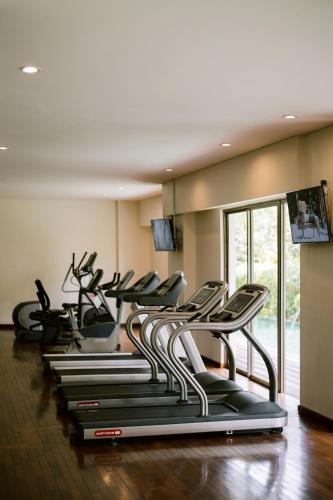 a row of exercise bikes in a gym at MERUSAKA Nusa Dua in Nusa Dua
