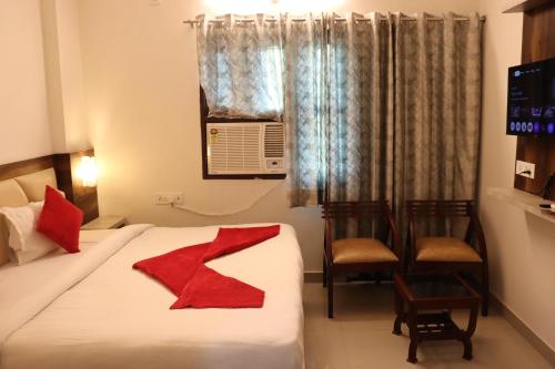 Una cama o camas en una habitación de Paradise Inn