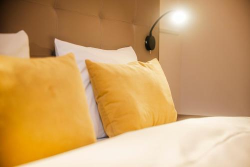 Parkhotel Kurhausにあるベッド