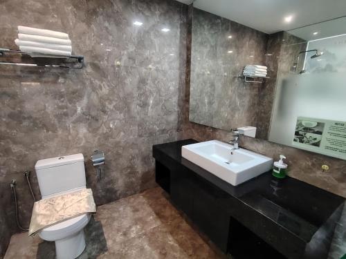 Ванная комната в The Shore Residence Melaka