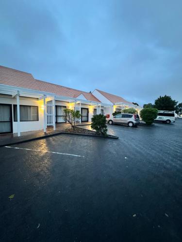 a parking lot in front of a motel at Mt Wellington Motel in Auckland