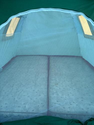 a small bed in a tent with a mattress at Garni tent in Aghk'ilisa