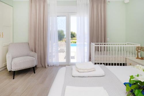 A bed or beds in a room at Villa Baycasa