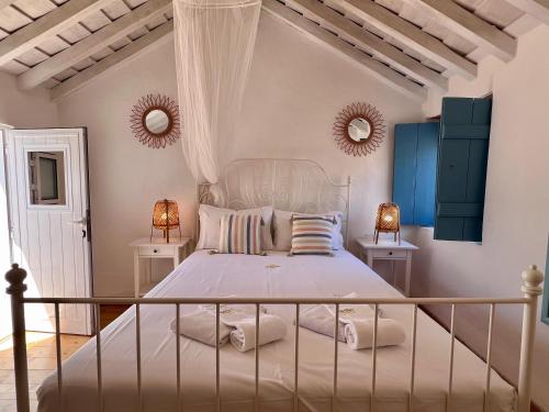 Ένα ή περισσότερα κρεβάτια σε δωμάτιο στο Casa do Pescador By ALGARTUR