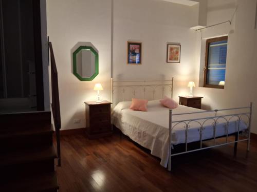 Ένα ή περισσότερα κρεβάτια σε δωμάτιο στο La Residenza 92