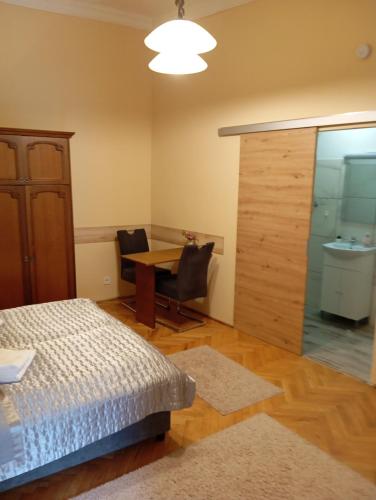 Postel nebo postele na pokoji v ubytování Amicii apartman
