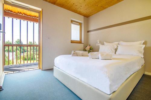Katil atau katil-katil dalam bilik di thecamp Hôtel & Lodges - Aix en Provence