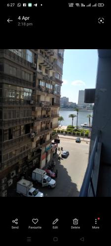a view of a parking lot from a building at Villa Apartment Nile View in City Center in Cairo