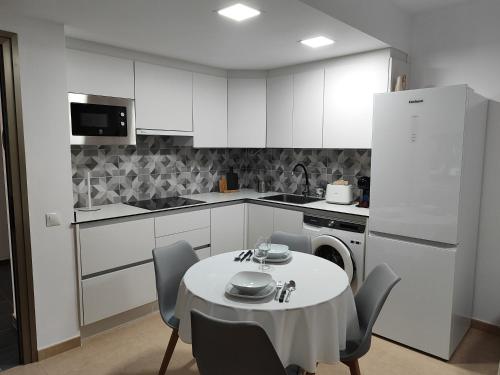 Кухня или мини-кухня в Casa Vacacional Ares
