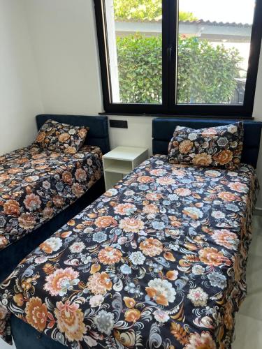 Katil atau katil-katil dalam bilik di Marina Smir luxury home