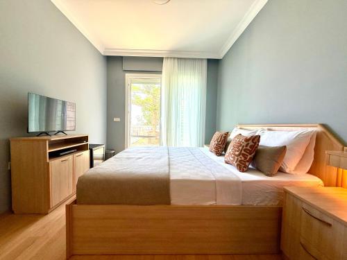Postel nebo postele na pokoji v ubytování Miromara Hotel Karaburun