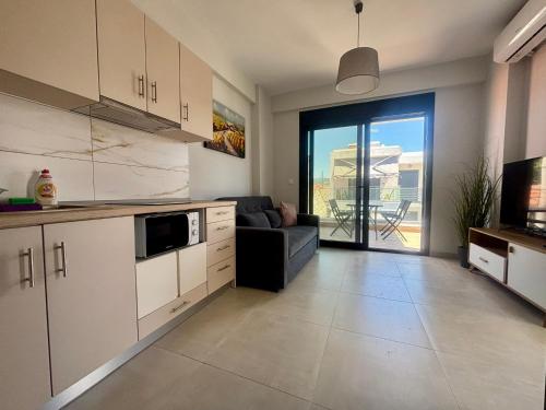 Kuchyň nebo kuchyňský kout v ubytování Ariadne Complex Apartment AD7-08