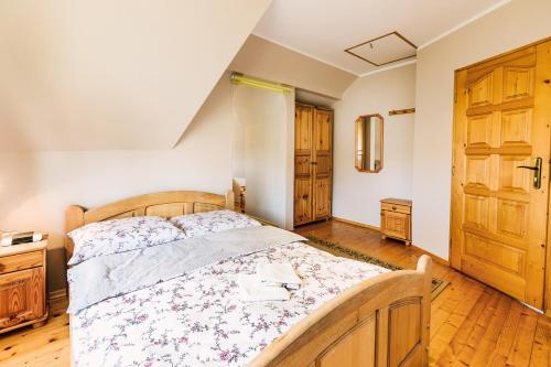 Postel nebo postele na pokoji v ubytování Agrozacisze