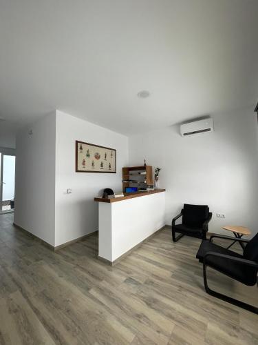Posezení v ubytování Hostal Malia
