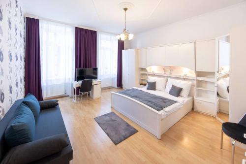 En eller flere senge i et værelse på Premium Deluxe Zentrum nähe