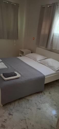 Katil atau katil-katil dalam bilik di Dios Apartment by Agora Flats