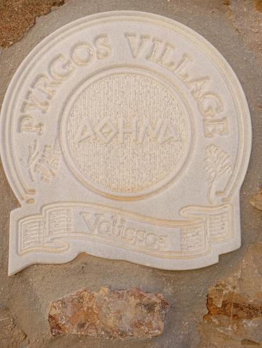 a sign on the ground with the word albuquerque at Volissos Sea View Maisonettes in Volissos