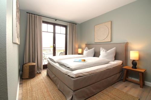 Katil atau katil-katil dalam bilik di Hafen-Appartement Fritz