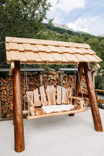 a gazebo with chairs chained to it at Ursa Camp in Gornje Lipovo