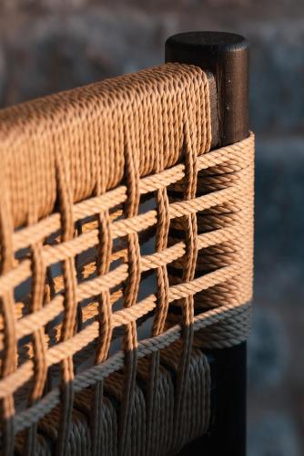 a close up of a wooden pole with ropes on it at Castor & Pollux in Kotrónion
