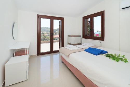 Letto o letti in una camera di Blue Dream Villa