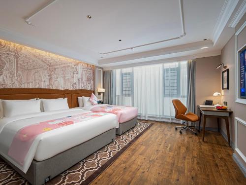 Ein Bett oder Betten in einem Zimmer der Unterkunft Vienna International Hotel--Free Shuttle Service to East Gate of forest park,Free Chinese-western Breakfast,Free Freah Coffee,Free Self-Service Laundry & Drying, Attraction Tickets Serivce in advance
