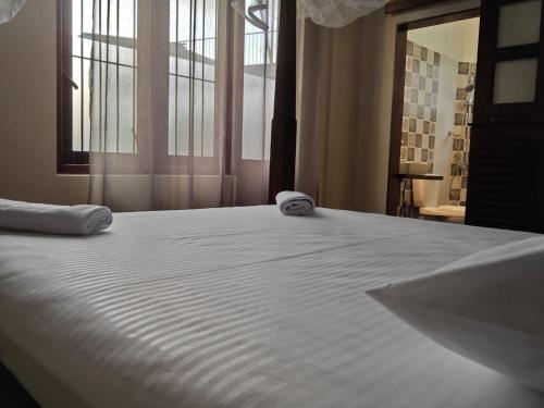 Postel nebo postele na pokoji v ubytování Candy Villa