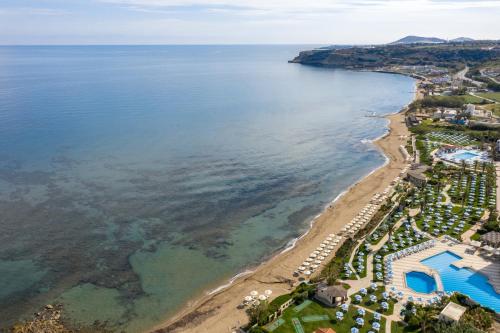 an aerial view of the beach and the ocean at Creta Star Hotel - Adults Only in Skaleta
