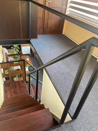 an overhead view of a staircase with a stair railing at Airport waterfront chalet in Katunayake