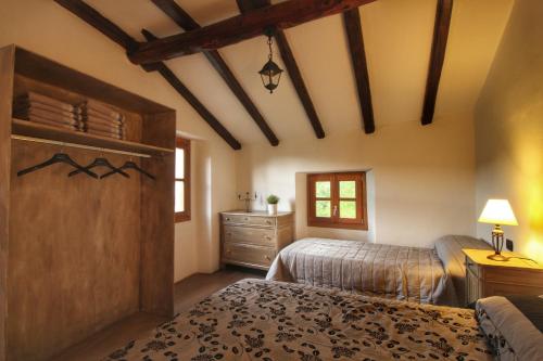 A bed or beds in a room at Country House Cozzena