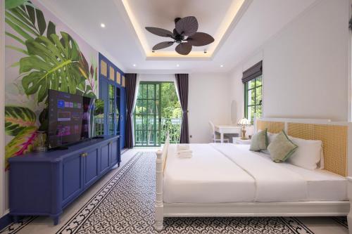 เตียงในห้องที่ Lotus Villa Khem beach Phu Quoc